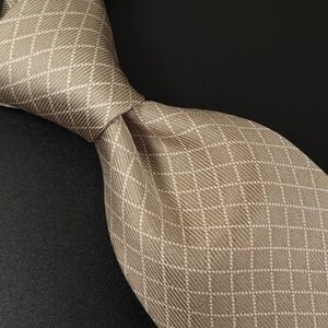 IZOD 100% Silk Necktie, Color Khaki With Plaid Pattern.